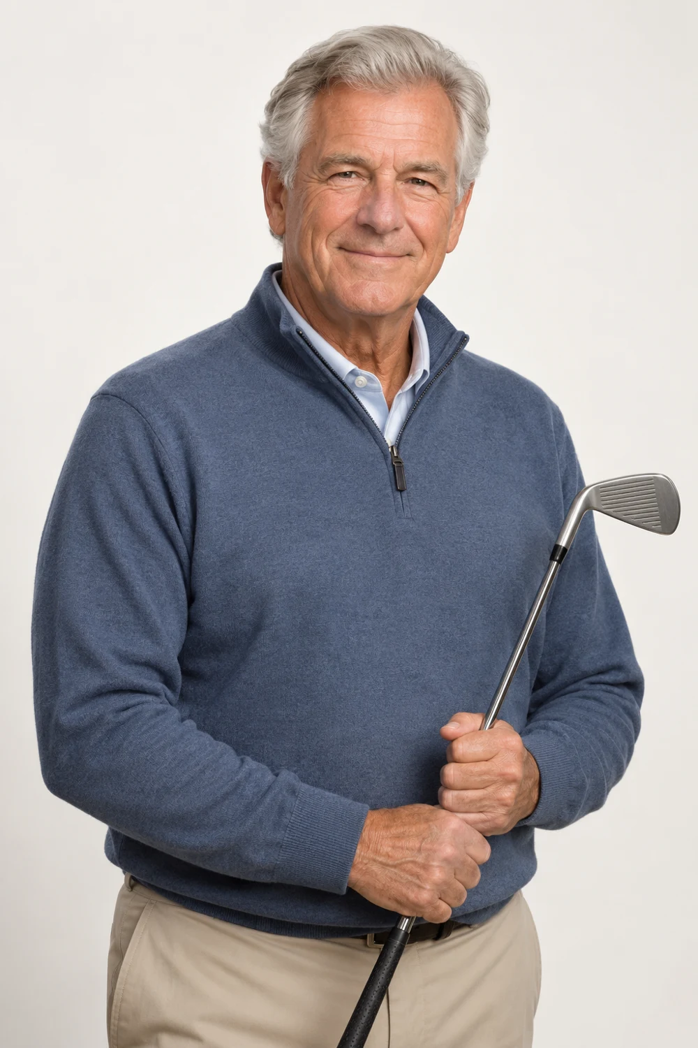 Coach Roger Hensley holding an iron